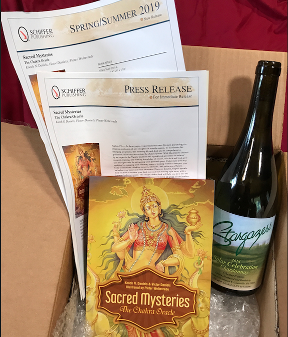 The box from the publisher, with a bottle of Stargazers’ wine